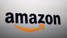 Amazon logo on a gray wall