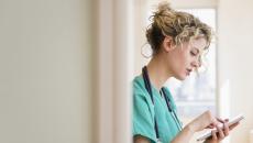 Nurse using a tablet