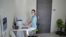 Clinician conducts a telehealth appointment and patient assessment. 