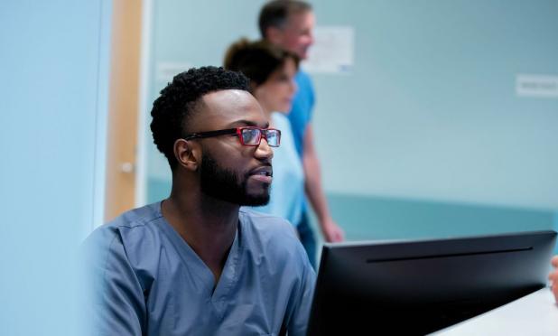 Healthcare worker using a computer