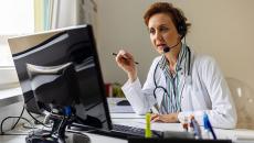 A doctor in a virtual consultation with a patient
